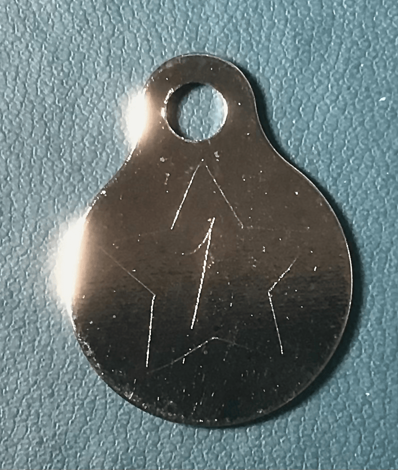 Gravure médaillon de métal